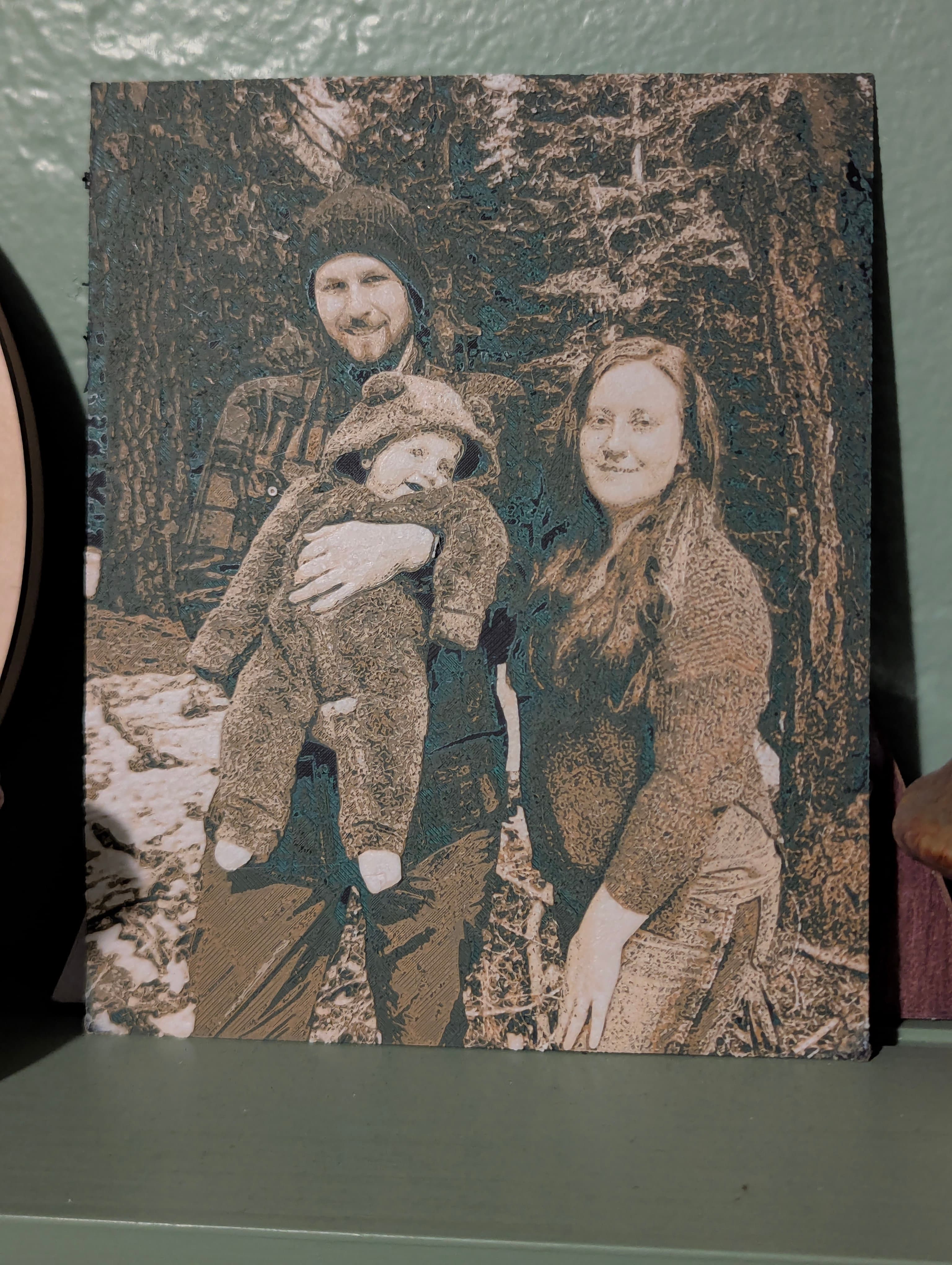 Family portrait filament painting — father, baby, and mother in a winter forest